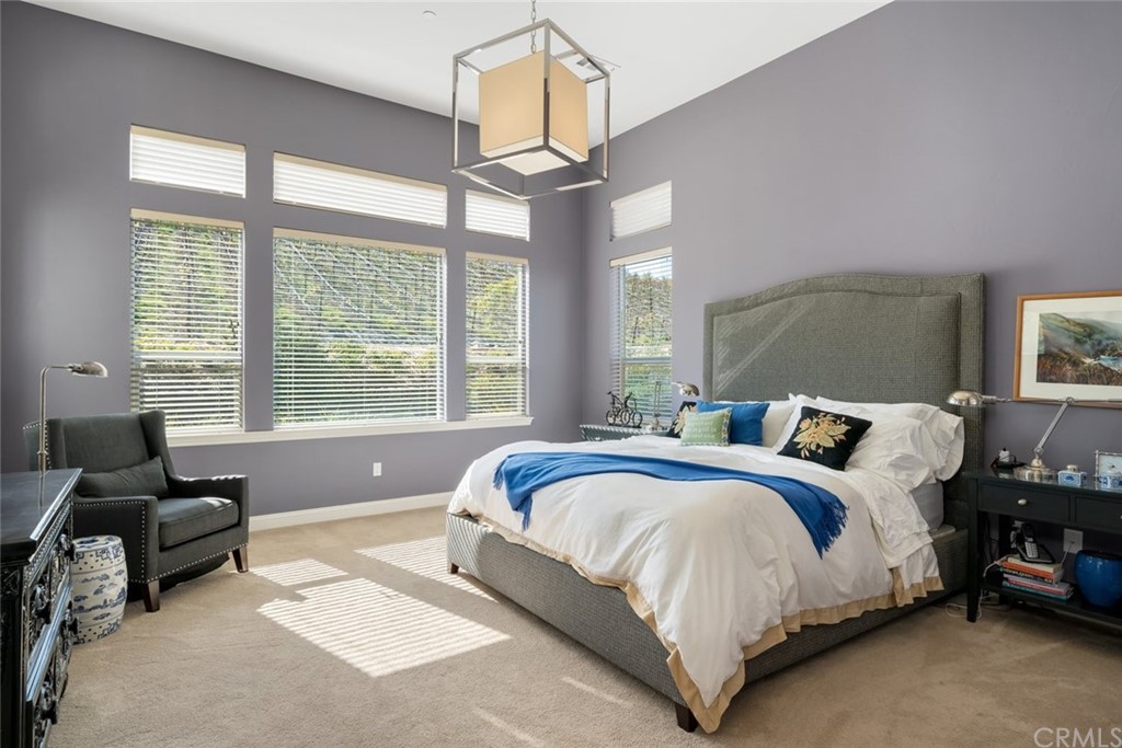 1481 Mesa Road Nipomo, CA 93444 - Photo 27 of 74 a bed room with a bed and a couch