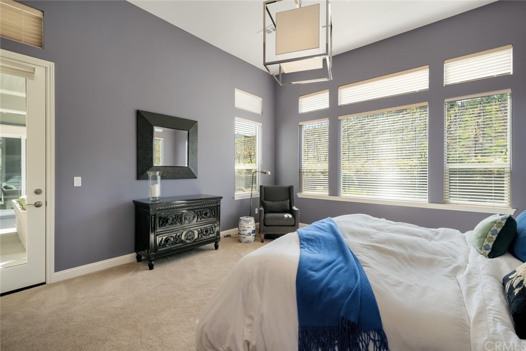 1481 Mesa Road Nipomo, CA 93444 - Photo 28 of 74 a bedroom with a bed couch and large window