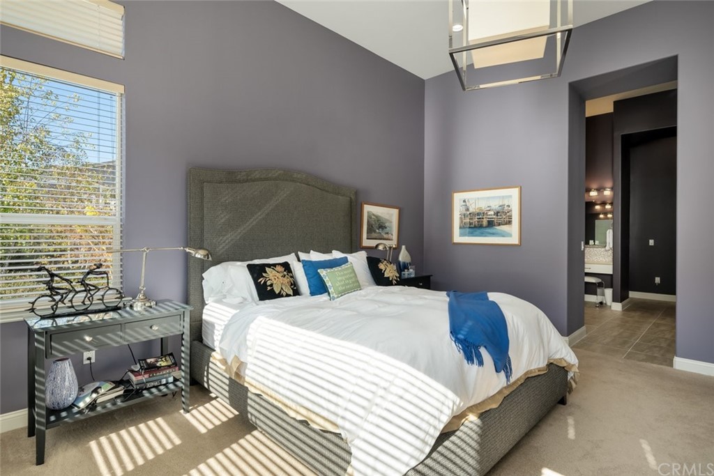 1481 Mesa Road Nipomo, CA 93444 - Photo 29 of 74 a bedroom with a bed and wooden floor