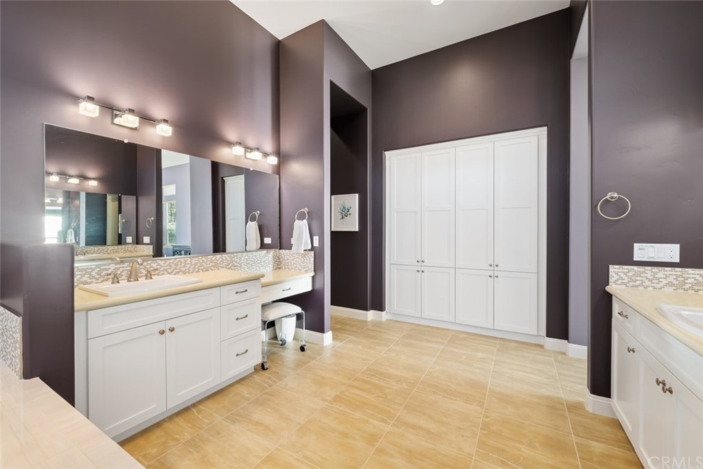 1481 Mesa Road Nipomo, CA 93444 - Photo 32 of 74 a spacious bathroom with a granite countertop sink two mirror and shower