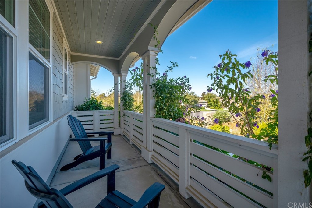 1481 Mesa Road Nipomo, CA 93444 - Photo 5 of 74 a wooden bench sitting in front of a building
