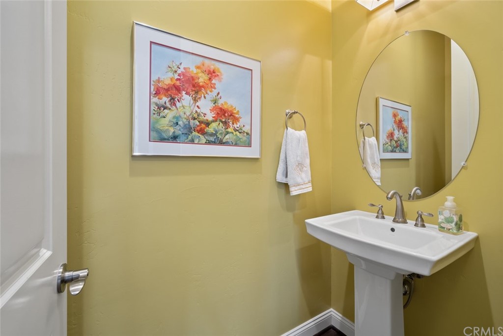 1481 Mesa Road Nipomo, CA 93444 - Photo 42 of 74 a bathroom with a sink and a mirror