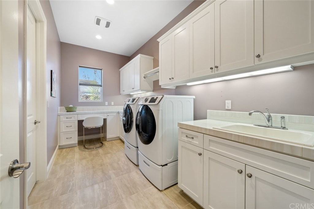 1481 Mesa Road Nipomo, CA 93444 - Photo 43 of 74 a utility room with sink dryer and washer