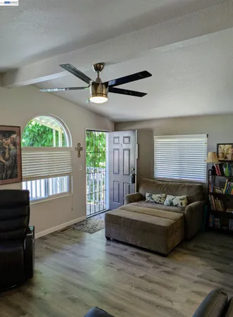 a bedroom with a bed and a walk in closet