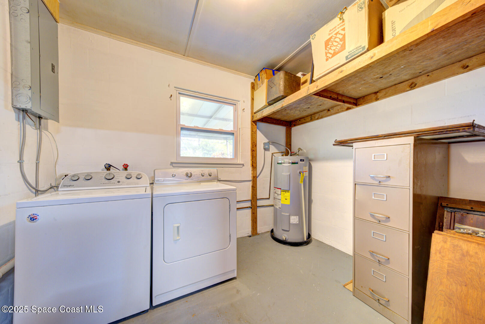 813 7th Street Merritt Island, FL 32953 - Photo 19 of 28 a utility room with dryer and washer