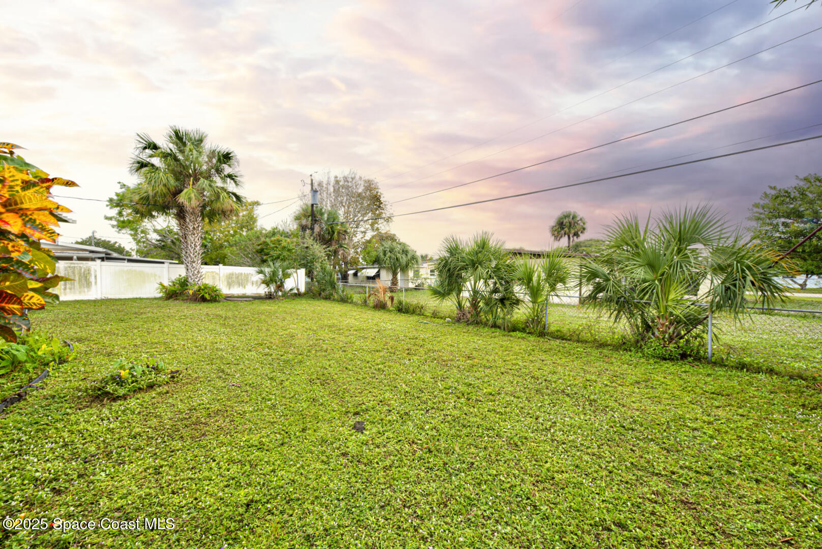 813 7th Street Merritt Island, FL 32953 - Photo 24 of 28 a view of an outdoor space and a yard