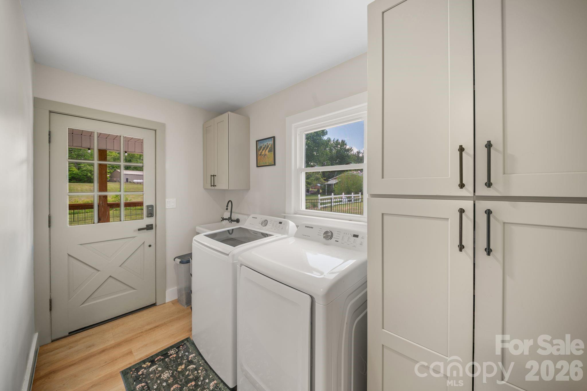 97 Paul Holland Road Canton, NC 28716 - Photo 24 of 35 a utility room with dryer and washer