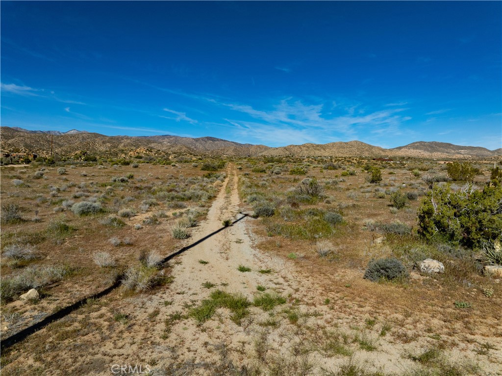51856 Trails End Road Pioneertown, CA 92268 - Photo 16 of 45 a view of sky view of mountain