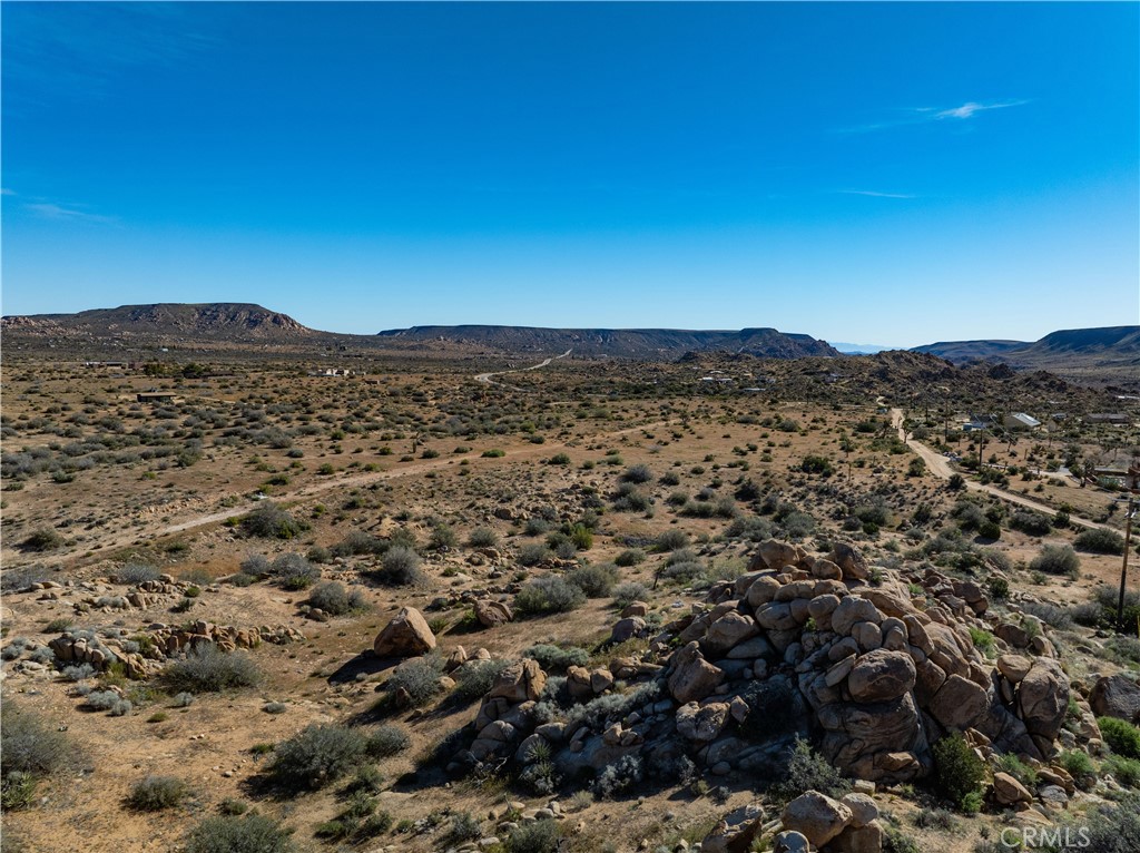 51856 Trails End Road Pioneertown, CA 92268 - Photo 24 of 45 an aerial view of residential house with green space