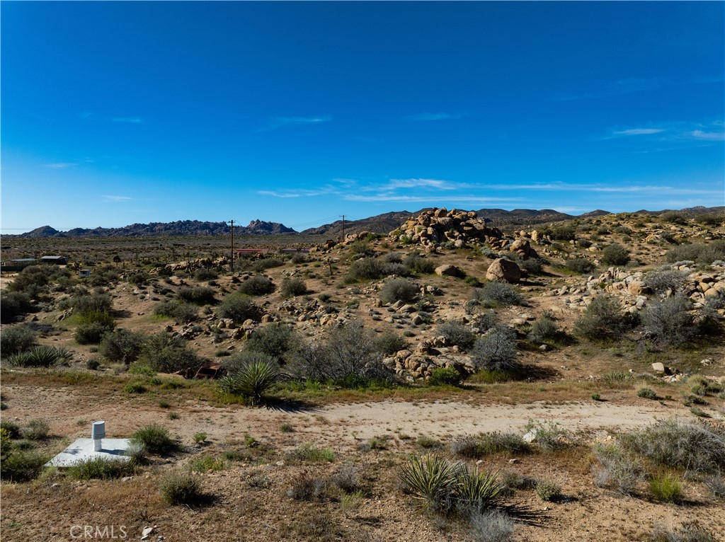 51856 Trails End Road Pioneertown, CA 92268 - Photo 31 of 45 a view of a large mountain with green space