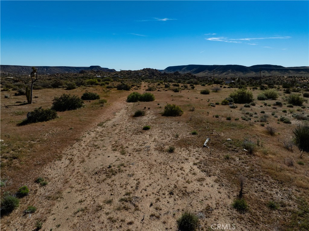 51856 Trails End Road Pioneertown, CA 92268 - Photo 42 of 45 a view of mountain with sunset in background