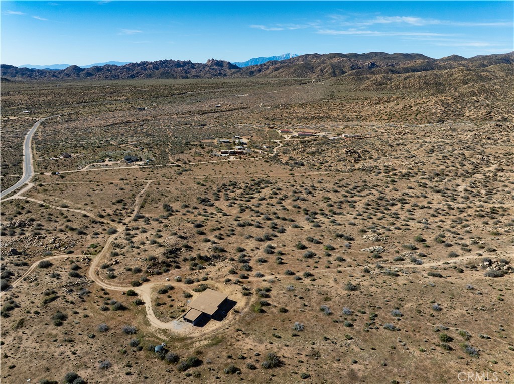 51856 Trails End Road Pioneertown, CA 92268 - Photo 7 of 45 a view of a field with an ocean
