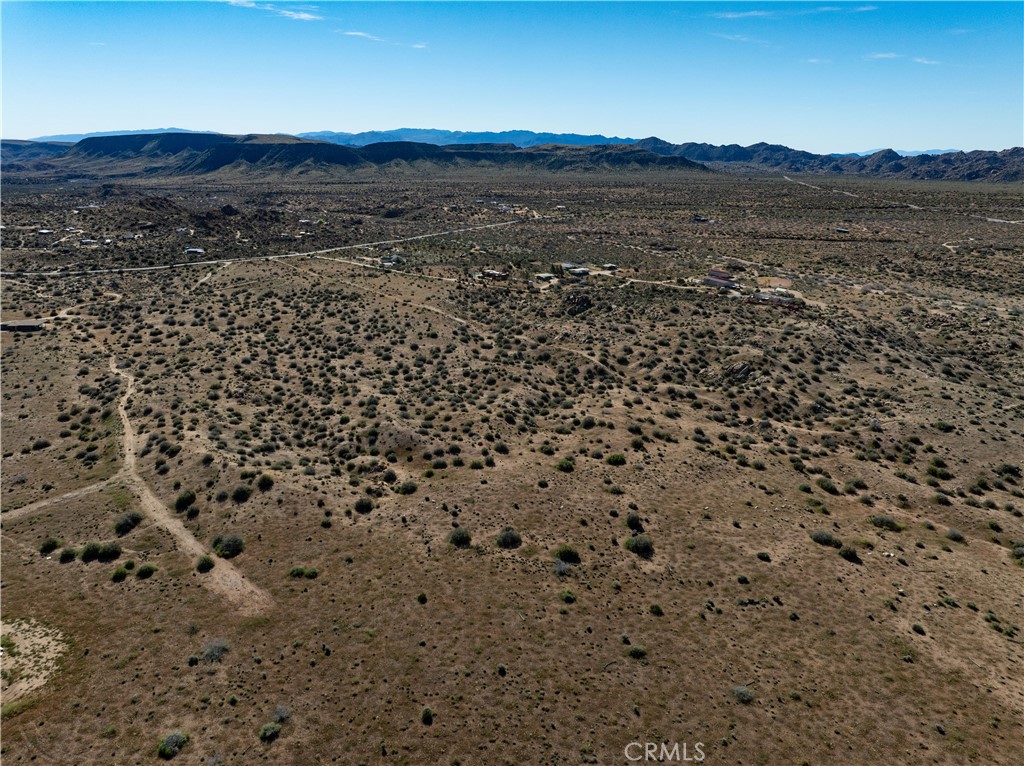 51856 Trails End Road Pioneertown, CA 92268 - Photo 9 of 45 a view of an outdoor space and mountain view