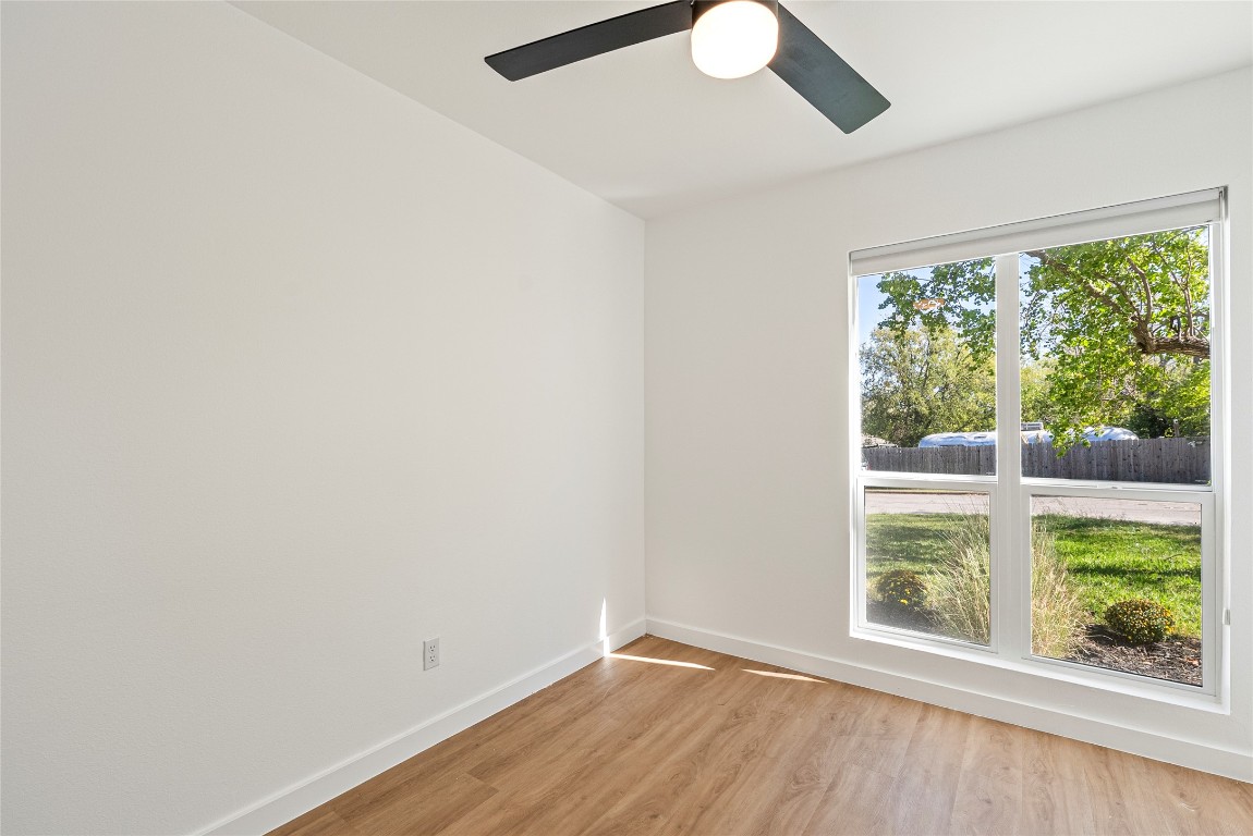 5200 King Charles Drive Austin, TX 78724 - Photo 14 of 22 Unfurnished room featuring light wood-type flooring and baseboards