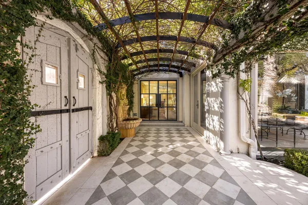 a view of living room with furniture and a flat screen tv