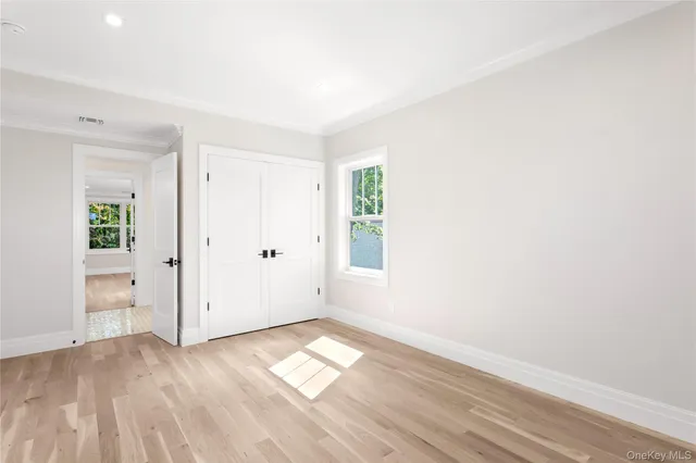 a view of balcony with wooden floor