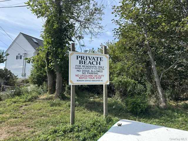 a sign on the side of the road