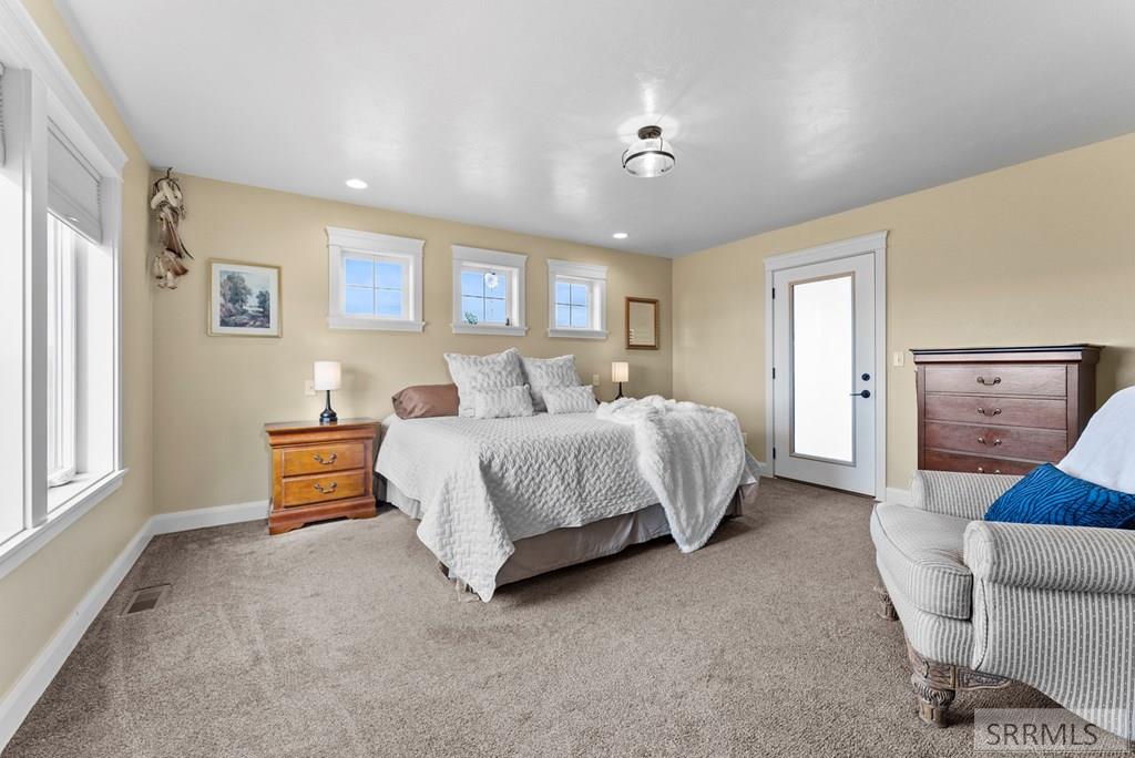2786 East 500 Road North St. Anthony, ID 83445 - Photo 19 of 75 Master Bedroom with door to west covered deck