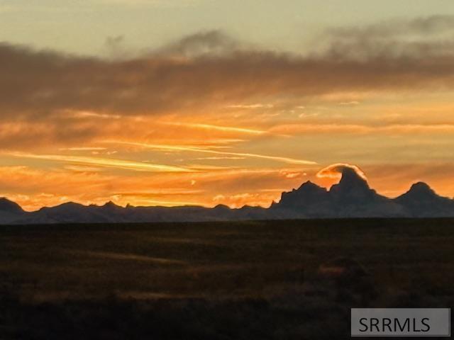 2786 East 500 Road North St. Anthony, ID 83445 - Photo 74 of 75 Tetons make the witches hat cloud formation