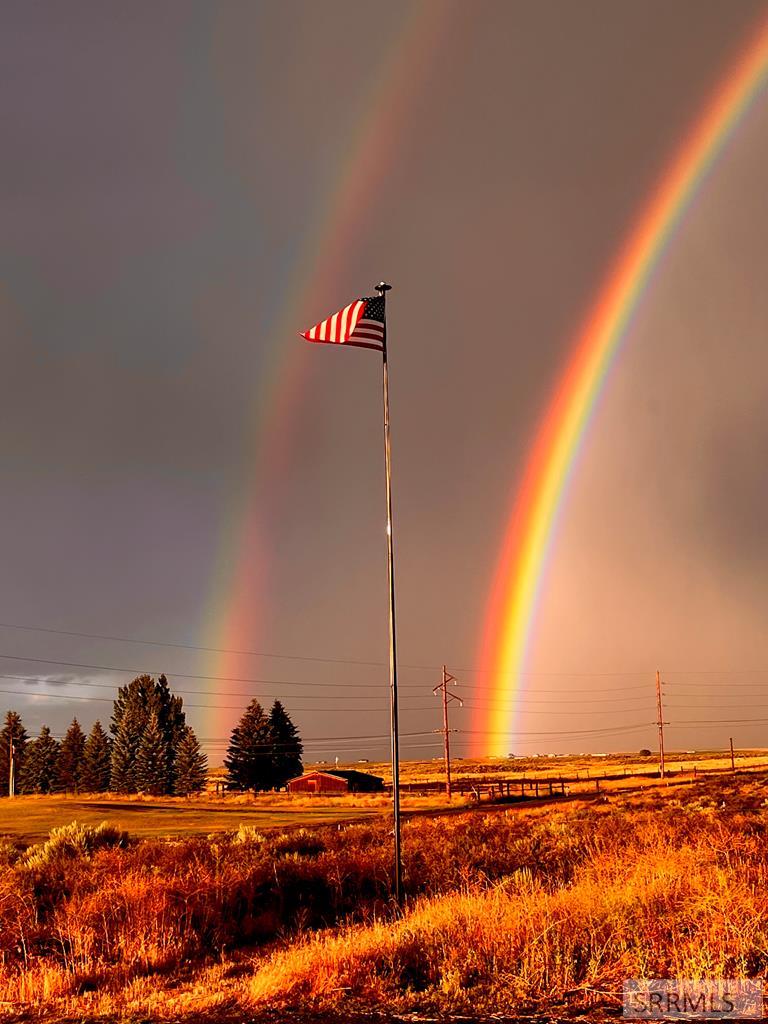 2786 East 500 Road North St. Anthony, ID 83445 - Photo 75 of 75 Flag pole and double rainbow