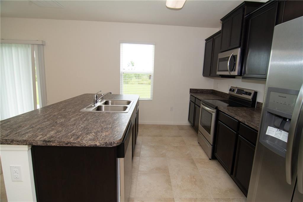 3116 Yellowstone Circle Fort Pierce, FL 34945 - Photo 6 of 10 YS KITCHEN2