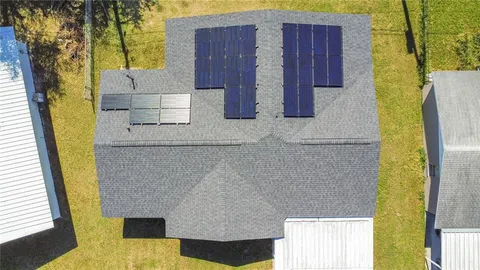 a front view of a house with swimming pool