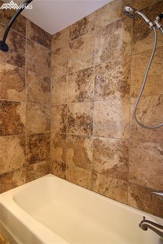 377 Ridge Road Divide, CO 80814 - Photo 13 of 35 Master bath, note the beautiful tile work