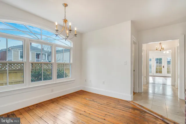 a kitchen with granite countertop a sink and a window
