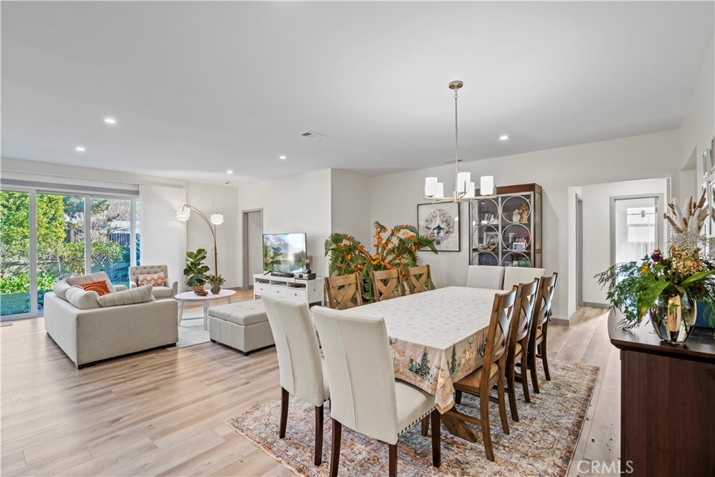 4704 Briggs Avenue La Crescenta, CA 91214 - Photo 12 of 28 a view of a dining room with furniture window and wooden floor