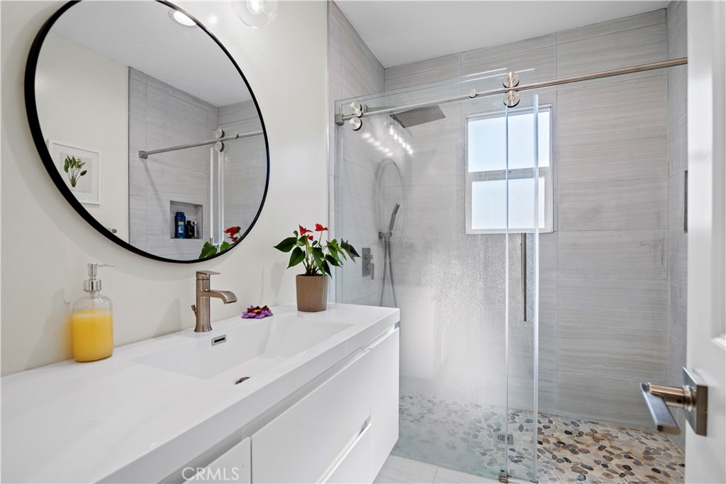 4704 Briggs Avenue La Crescenta, CA 91214 - Photo 19 of 28 a bathroom with a sink and a mirror