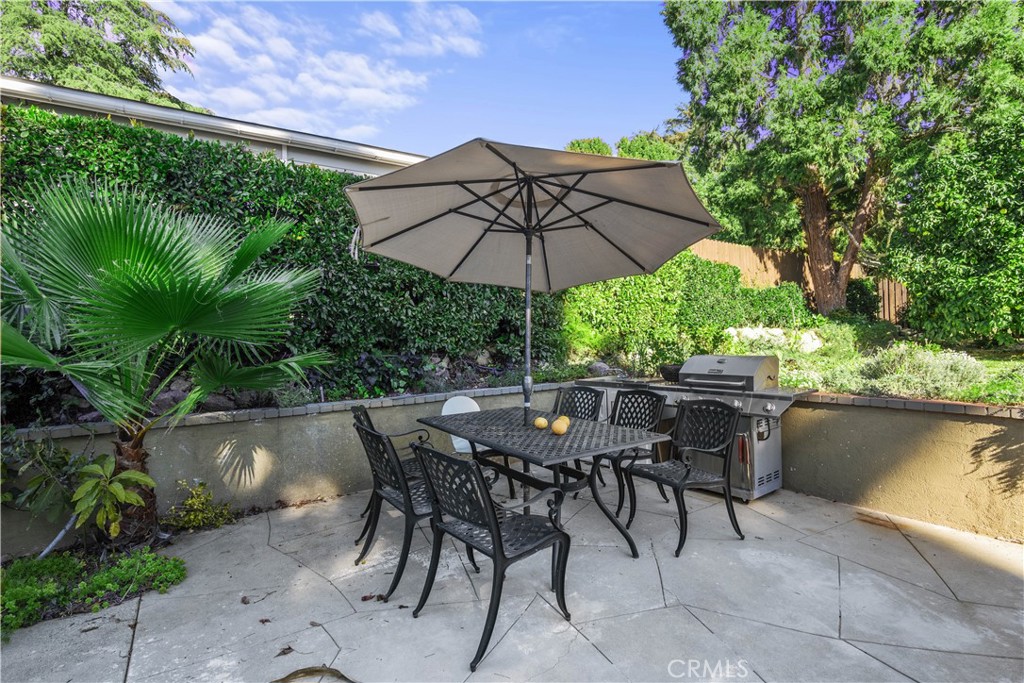 4704 Briggs Avenue La Crescenta, CA 91214 - Photo 23 of 28 an outdoor space with furniture and umbrella
