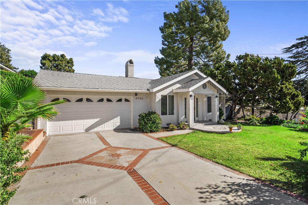 4704 Briggs Avenue La Crescenta, CA 91214 - Photo 27 of 28 a front view of a house with garden
