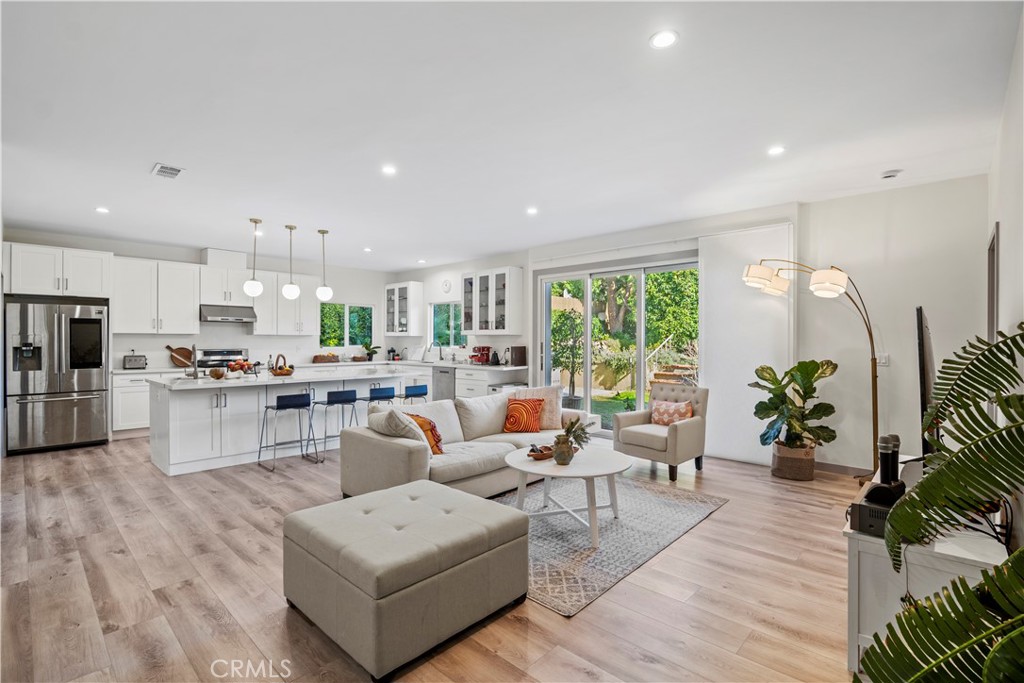 4704 Briggs Avenue La Crescenta, CA 91214 - Photo 3 of 28 a living room with furniture and a large window