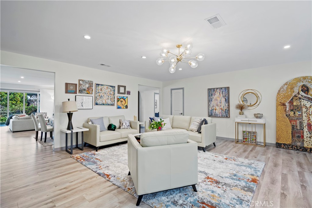 4704 Briggs Avenue La Crescenta, CA 91214 - Photo 5 of 28 a living room with furniture and wooden floor