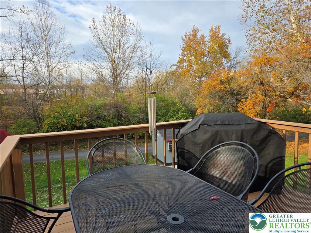 844 Catherine Drive Coplay, PA 18037 - Photo 13 of 52 a view of balcony with two chairs and a wooden fence