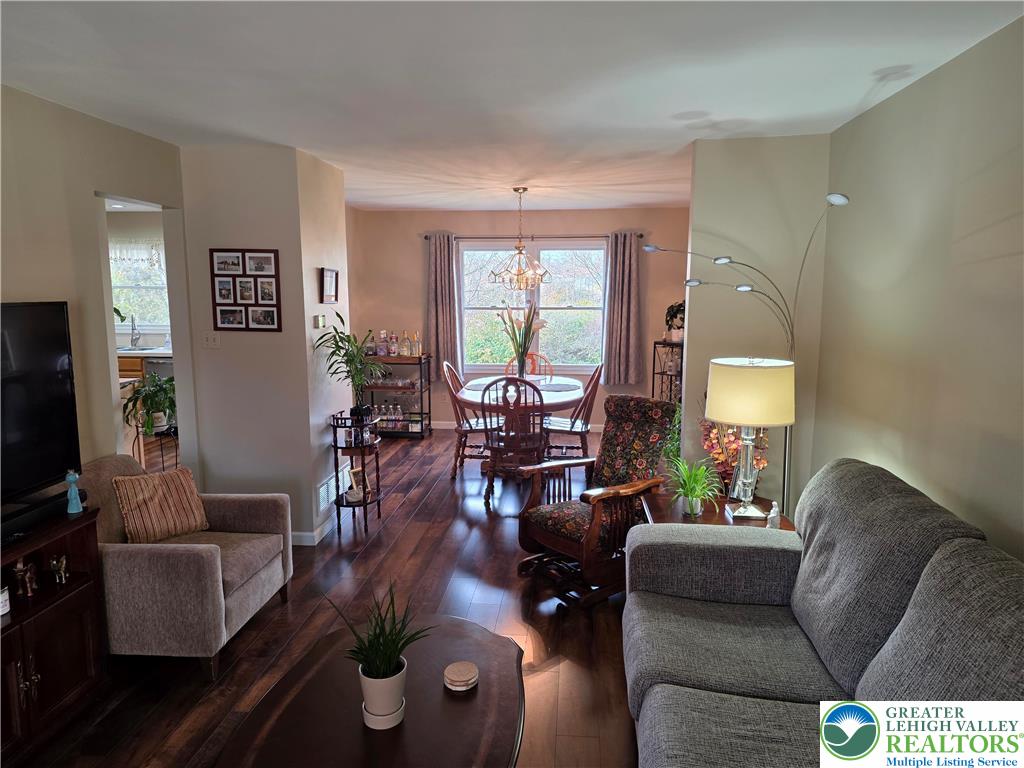 844 Catherine Drive Coplay, PA 18037 - Photo 23 of 52 a living room with furniture and a flat screen tv