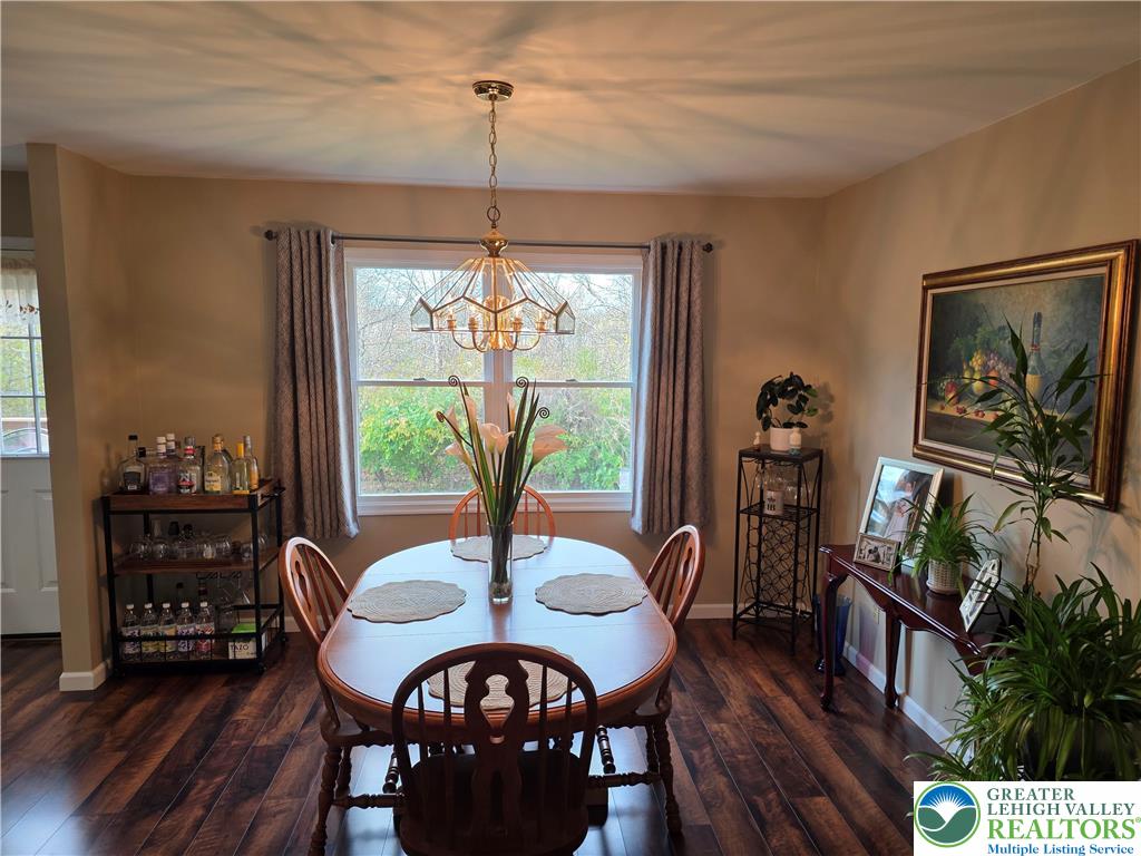 844 Catherine Drive Coplay, PA 18037 - Photo 24 of 52 a view of a dining room with furniture window and wooden floor