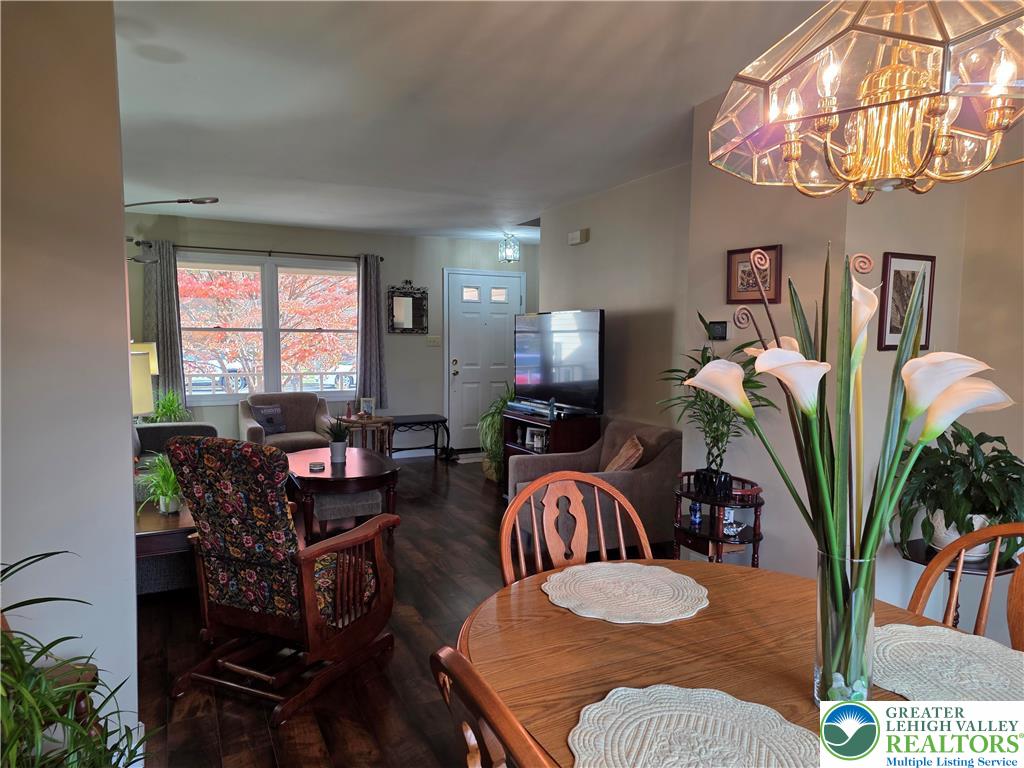 844 Catherine Drive Coplay, PA 18037 - Photo 28 of 52 a living room with furniture a chandelier and a potted plant