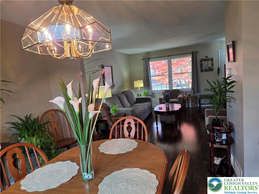 844 Catherine Drive Coplay, PA 18037 - Photo 29 of 52 a view of a dining room with furniture and chandelier