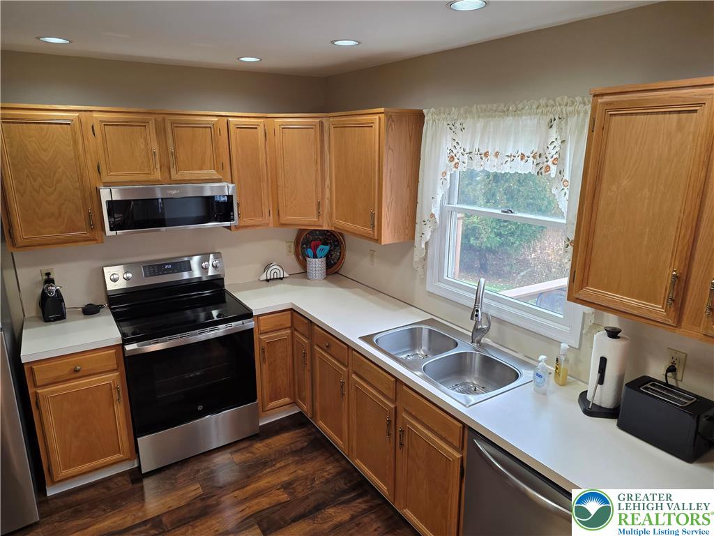 844 Catherine Drive Coplay, PA 18037 - Photo 36 of 52 a kitchen that has a sink and a stove