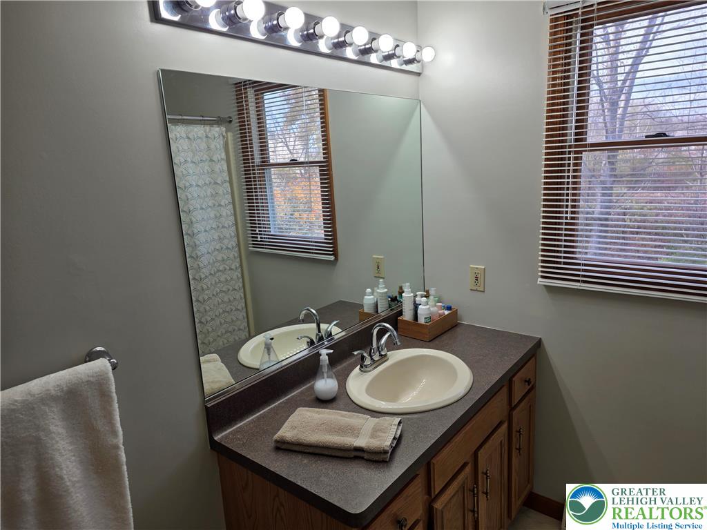 844 Catherine Drive Coplay, PA 18037 - Photo 48 of 52 a bathroom with a sink double vanity and a mirror