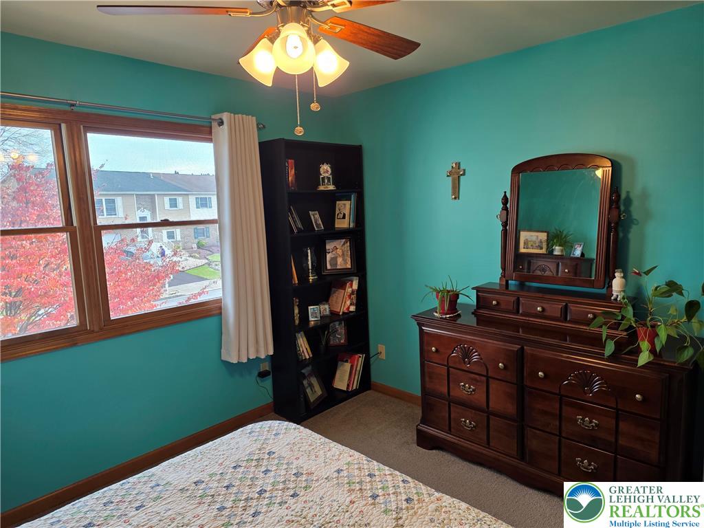 844 Catherine Drive Coplay, PA 18037 - Photo 50 of 52 a bedroom with a bed and a dresser in it