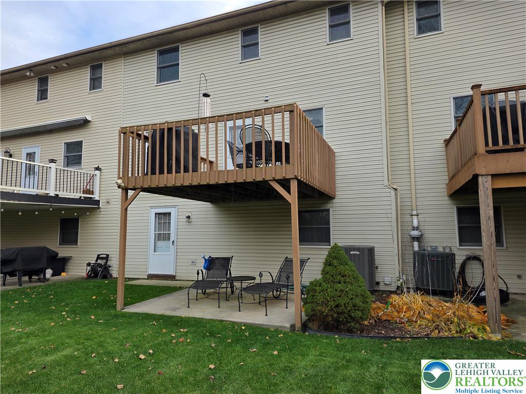 844 Catherine Drive Coplay, PA 18037 - Photo 5 of 52 a view of backyard of house with outdoor seating and barbeque oven