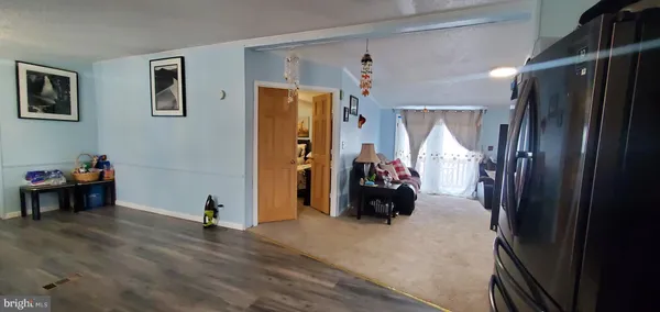 a room with furniture and a flat screen tv