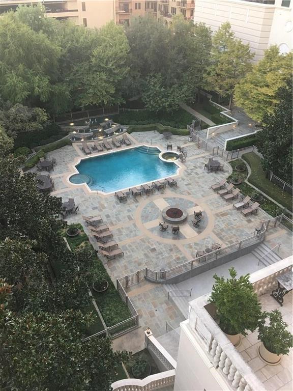 3535 Gillespie Street, Unit 505 Dallas, TX 75219 - Photo 5 of 5 a view of a swimming pool with a yard