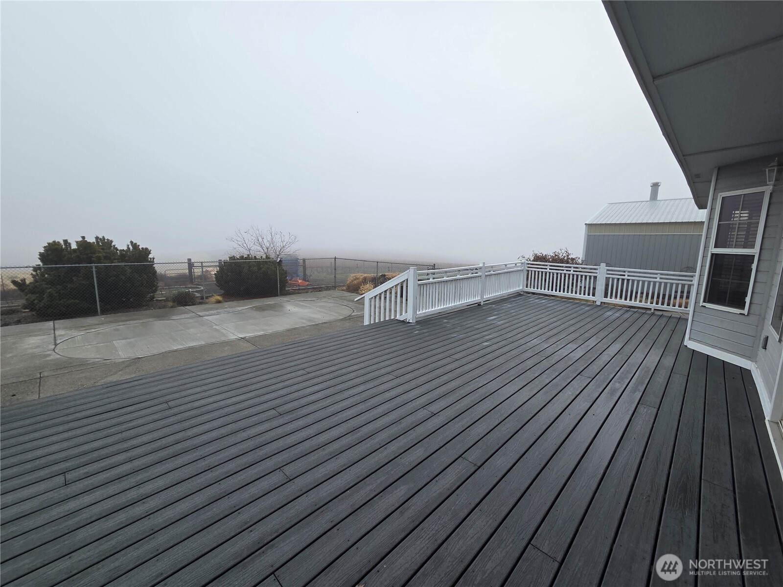 44907 West Knox Road Benton City, WA 99320 - Photo 11 of 12 a view of a terrace with wooden floor