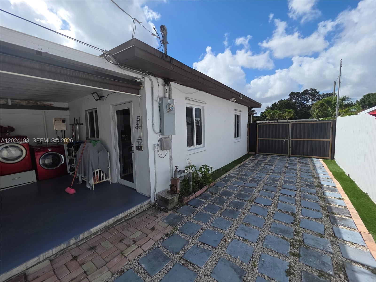 651 East 48th Street Hialeah, FL 33013 - Photo 25 of 52 a view of a porch