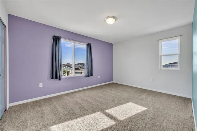 a view of an empty room with window