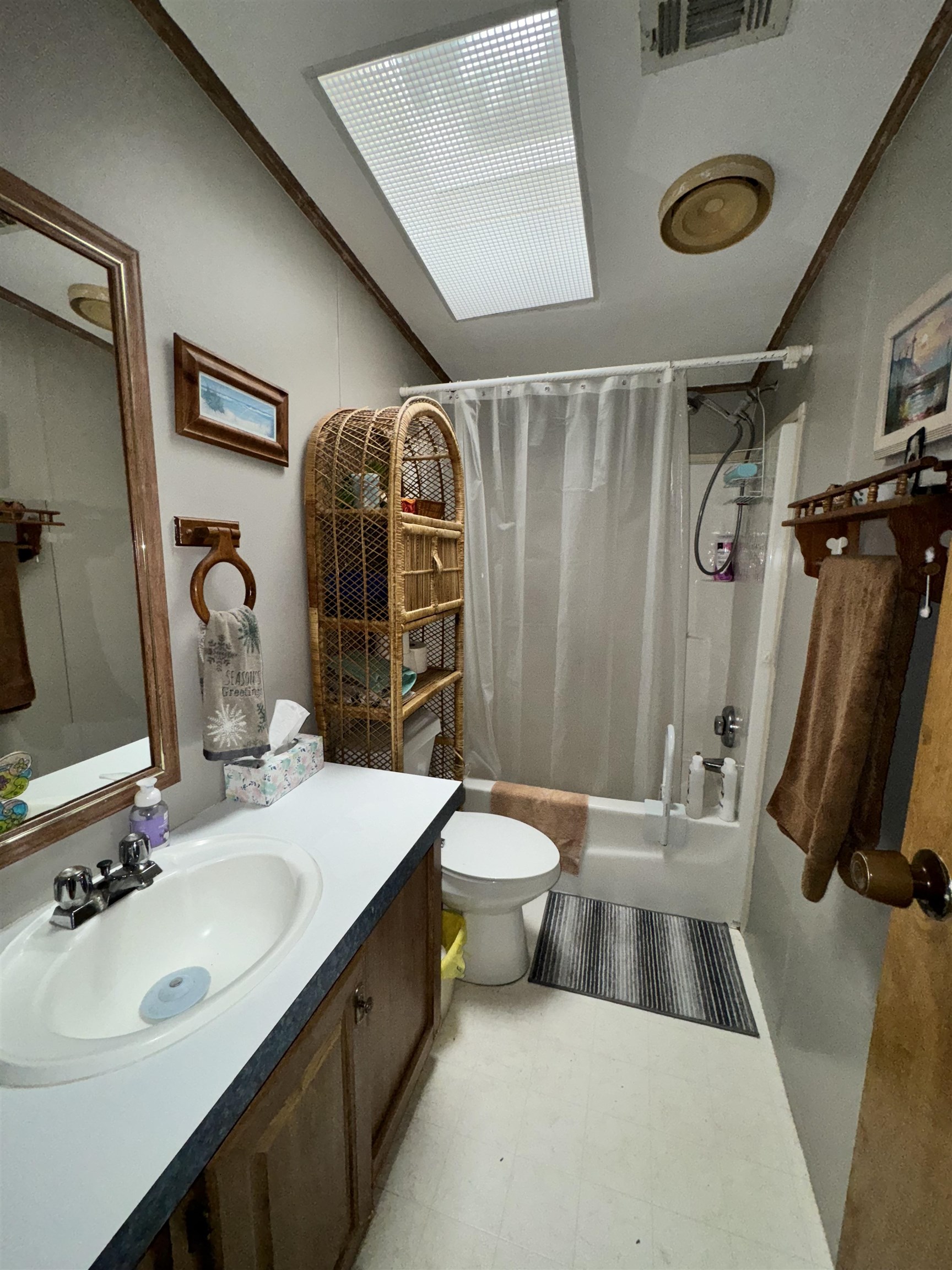5745 Datil Pepper Road St. Augustine, FL 32086 - Photo 32 of 36 a bathroom with a sink a toilet and shower
