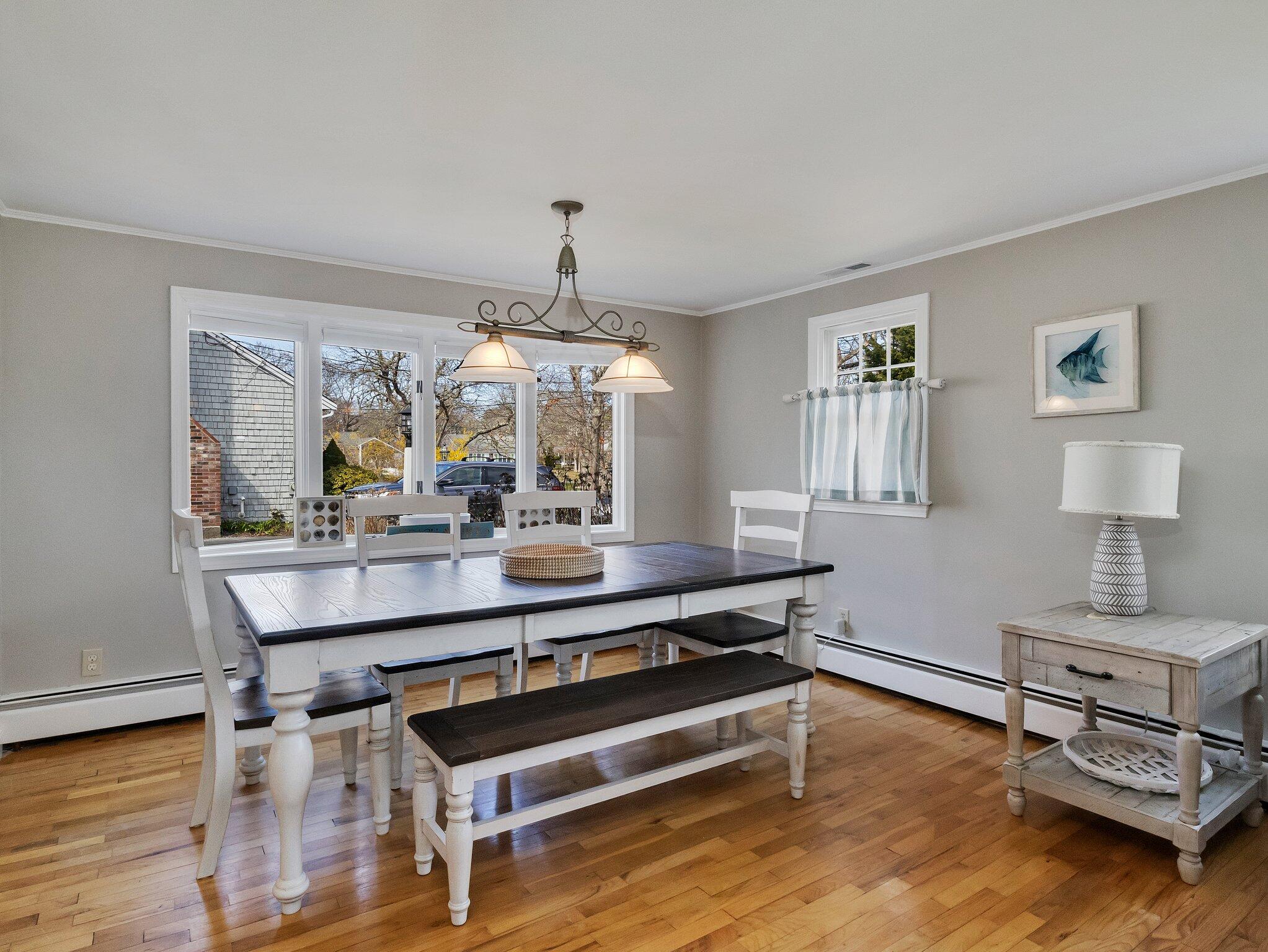 41 Harbor Road West Yarmouth, MA 02673 - Photo 13 of 56 a view of a room with kitchen island stainless steel appliances wooden floor and window
